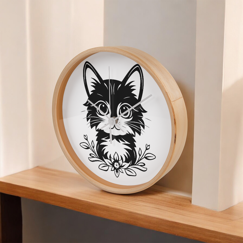Black and white line art of a kitten sitting among flowers on a 10" wood frame "Purfect Timing" clock.