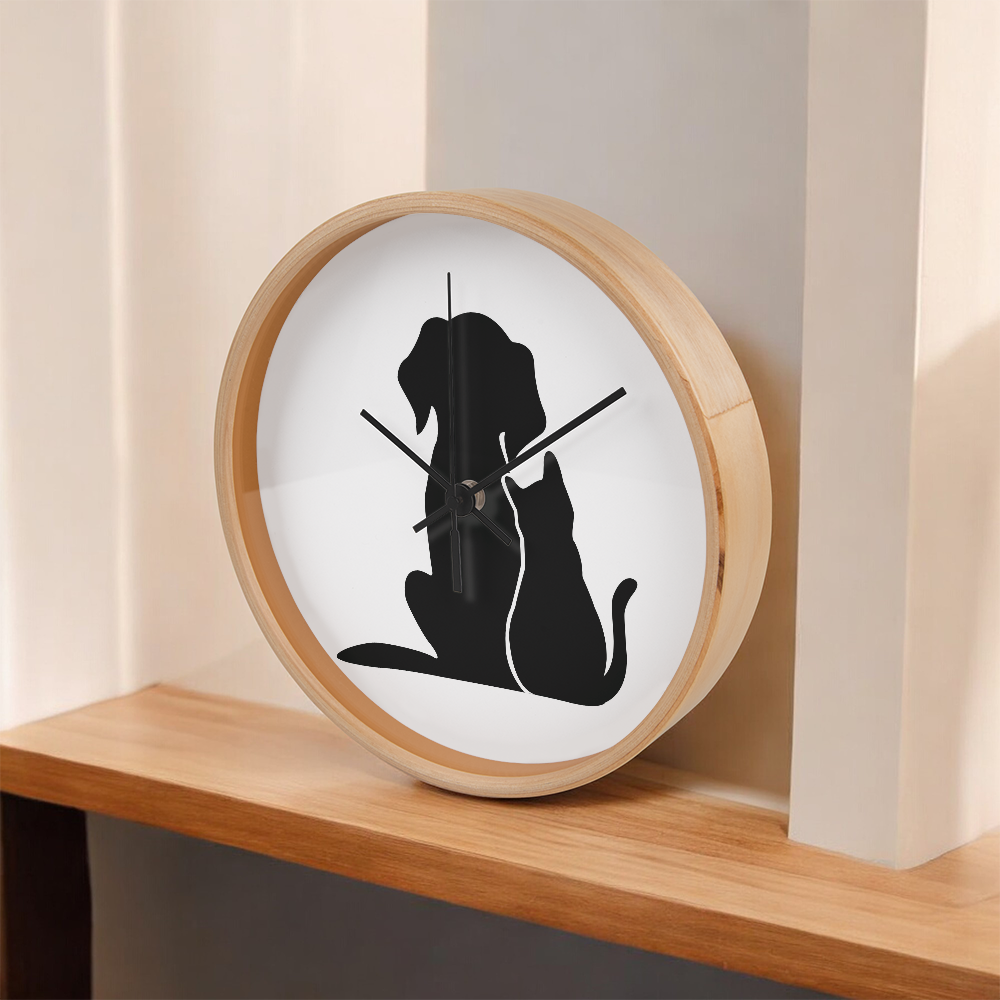 Silhouette of a cat and dog sitting closely together, depicted on the face of the "Unspeakable Bond" Wood Frame 10" Clock.