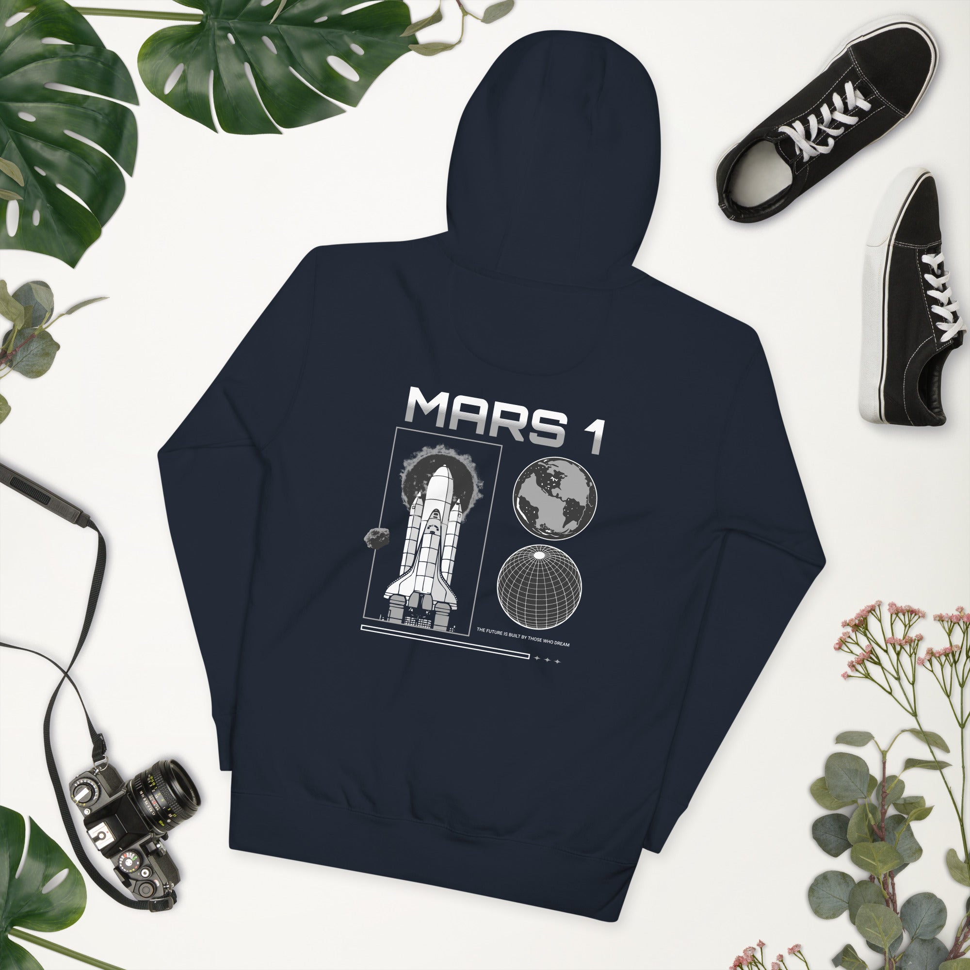 Back view of a navy blue hoodie with 'MARS 1' text above space shuttle and planet graphic.