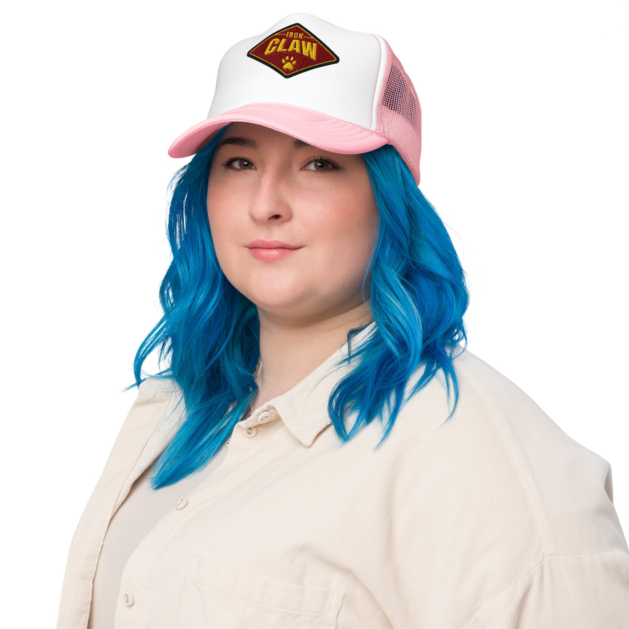 Model wearing white and pink Iron Claw trucker hat with diamond logo patch