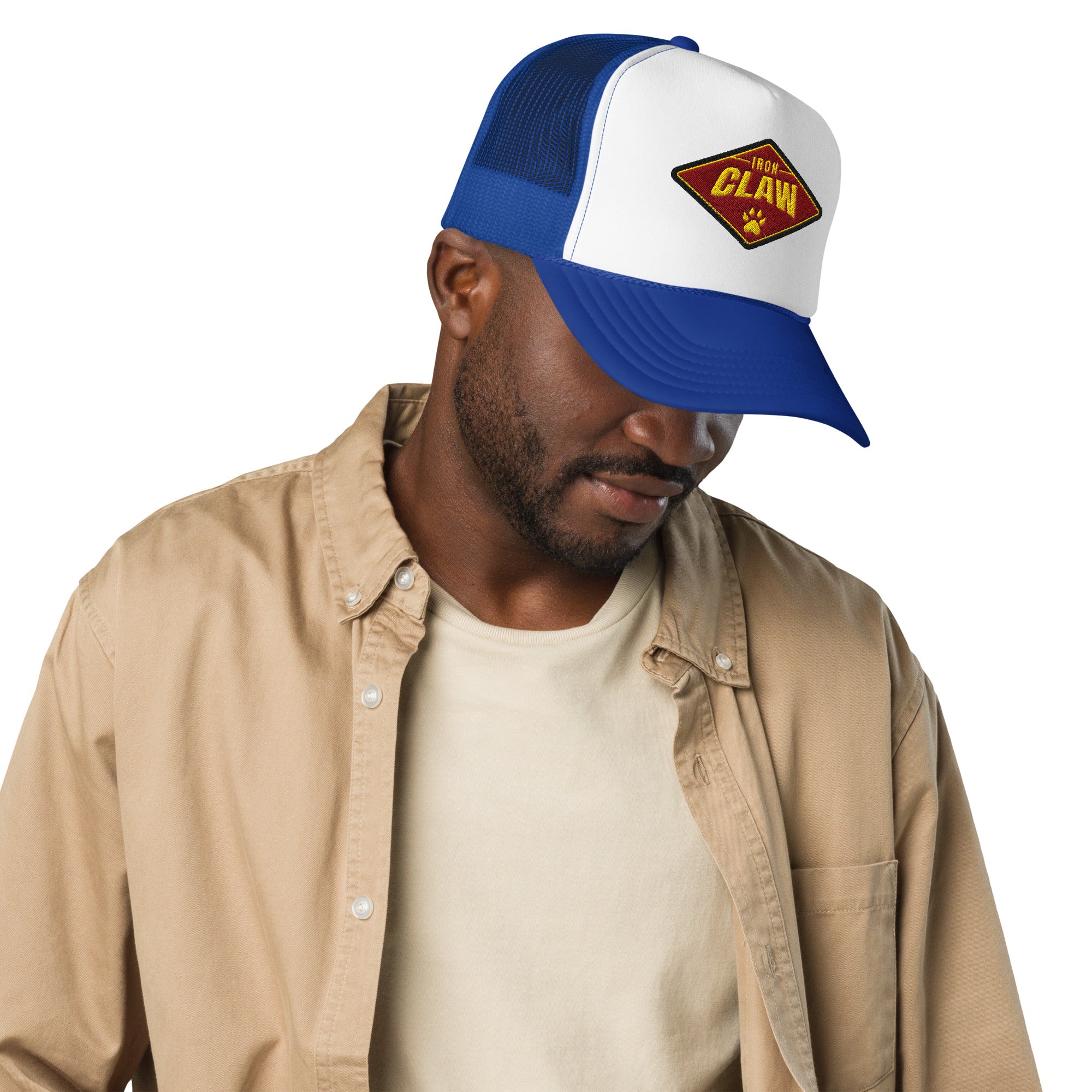 Model wearing white and blue Iron Claw trucker hat with diamond logo patch
