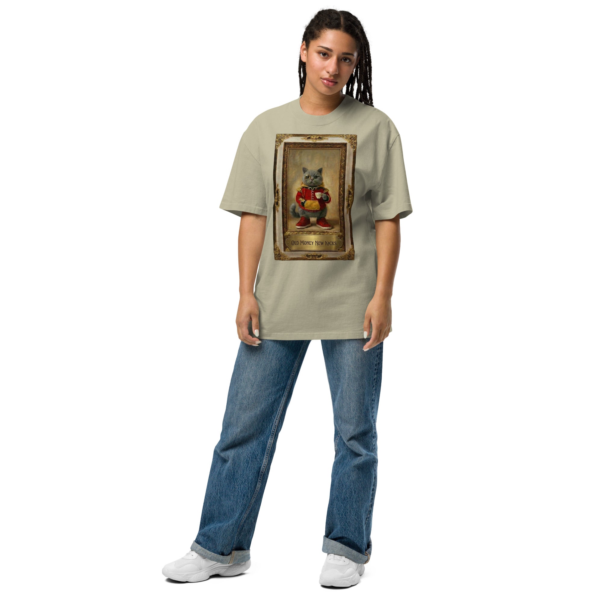 Model wearing tan oversized faded tee with vintage portrait graphic, front view