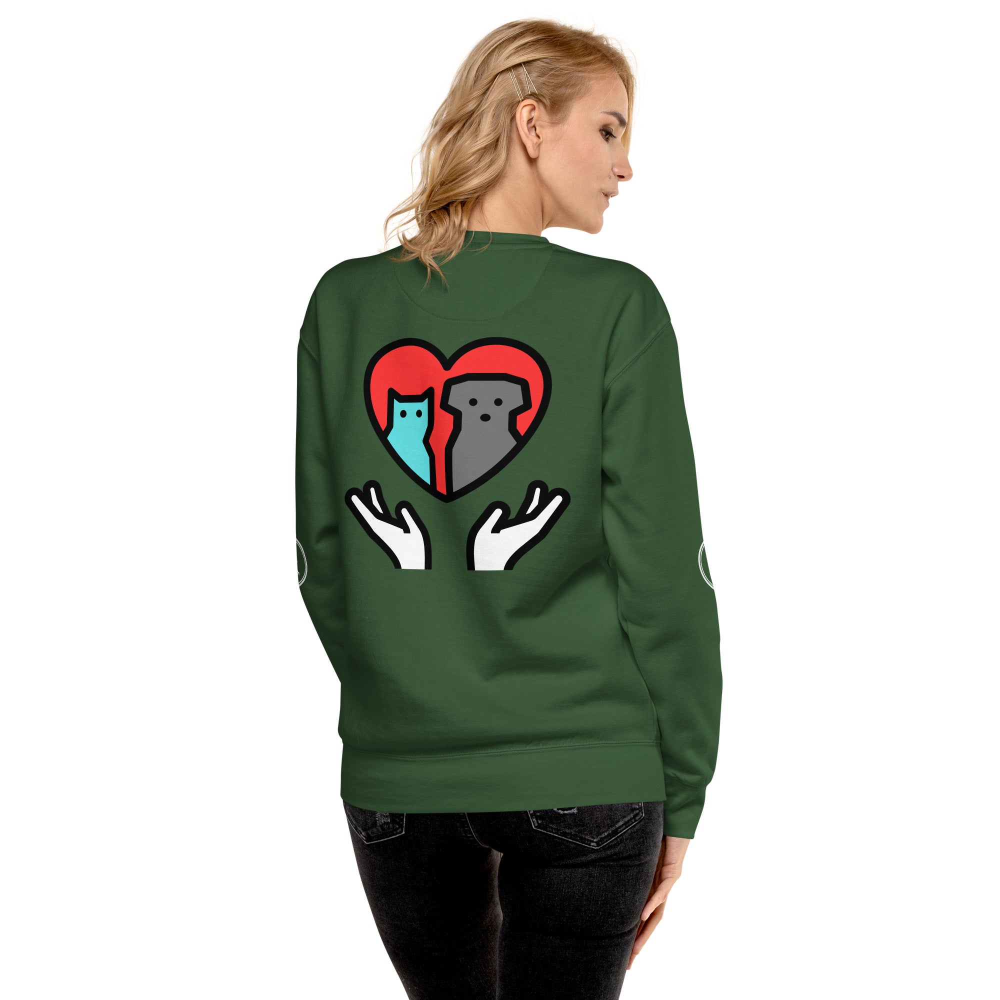 Back of sweatshirt: Graphic depicts two hands holding up a cat and a dog together inside a heart.