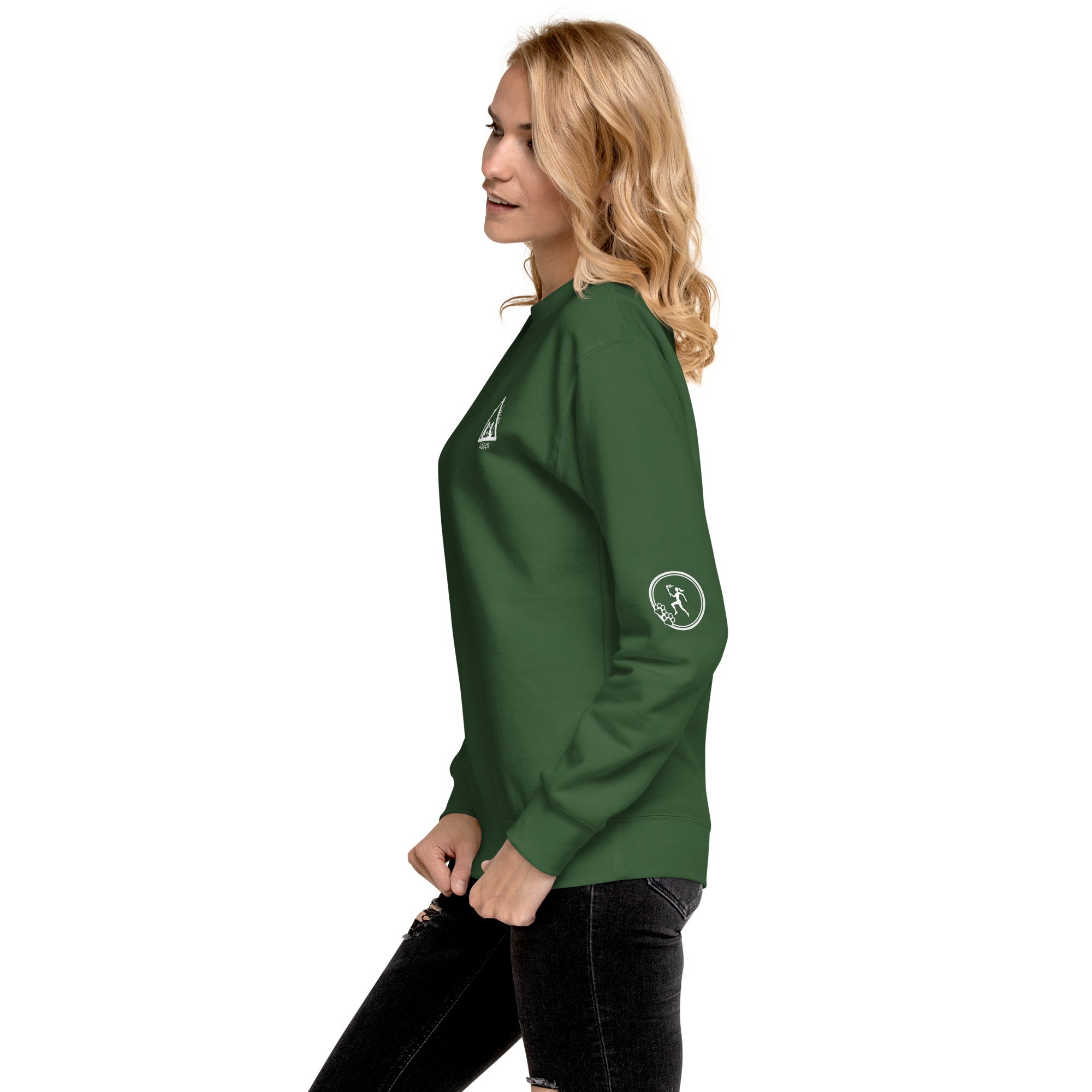 Left side of sweatshirt: Small graphic on left sleeve depicting a woman within a circle holding a torch while running towards three paws. 