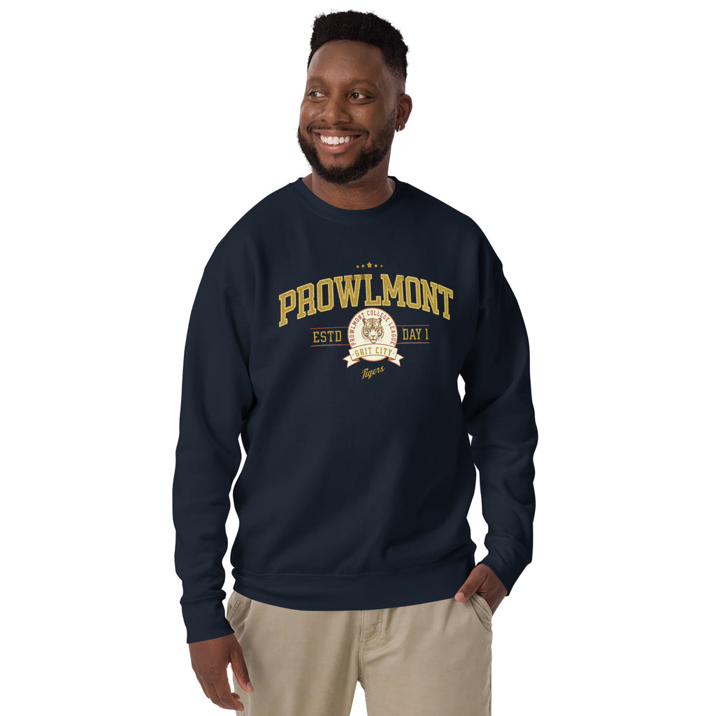 Man wearing a navy blue varsity style sweatshirt with yellow 'Prowlmont Grit City Tigers' text and tiger logo on a white background