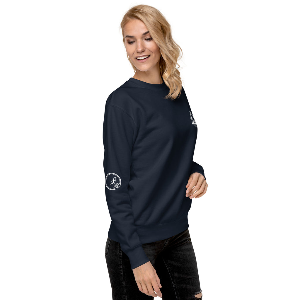 Right side of sweatshirt: Small graphic on right sleeve depicting a man within a circle holding a torch while running towards three paws. 