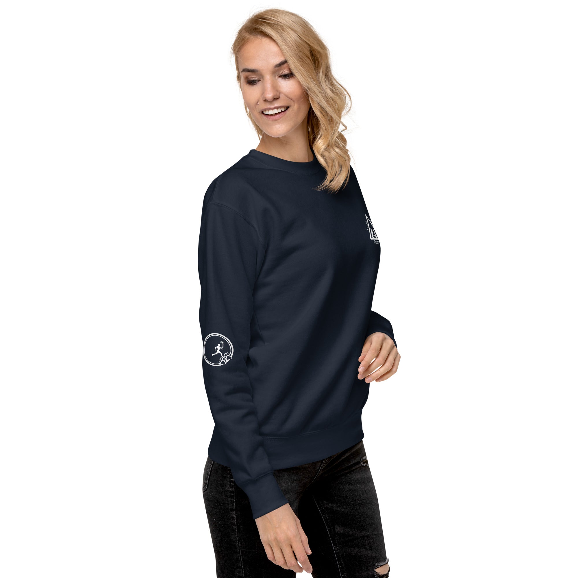 Right side of sweatshirt: Small graphic on right sleeve depicting a man within a circle holding a torch while running towards three paws. 