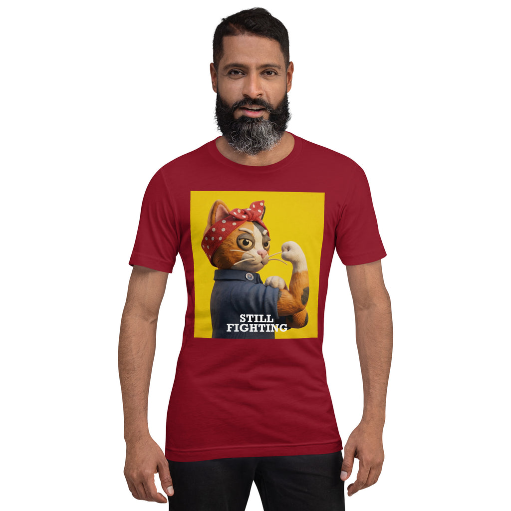 Model wearing Red Still Fighting T-Shirt with multicolor pop-art graphic