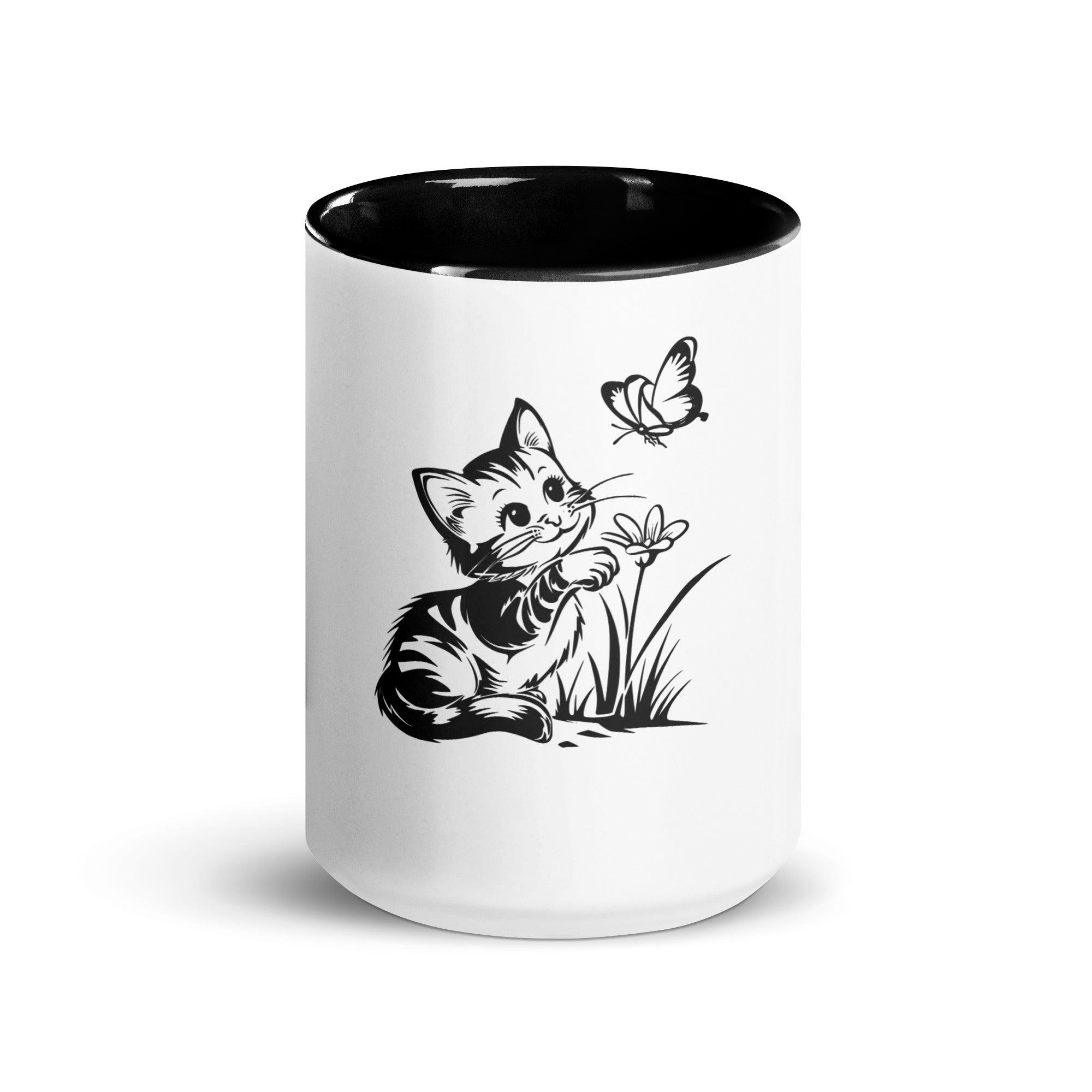 A white and black mug featuring a line art design of a playful encounter between a curious kitten and a gentle butterfly