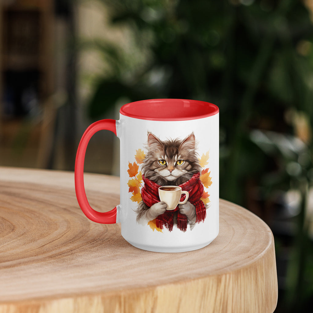 A white ceramic mug with a red rim and handle, featuring an illustration of a cat holding a cup with autumn leaves around it.